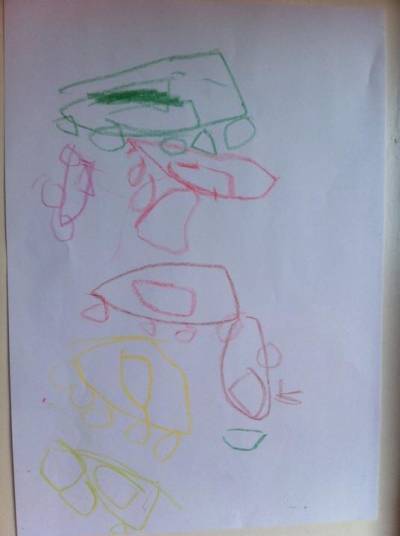 Bild 2. Pojke 1 år 8 mån ritar bilar